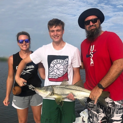 Snook, a 21-inch saltwater fish, caught in Tampa, Florida during cruises and fishing adventures