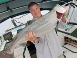 Angler with a 29-inch fish caught in Oakville