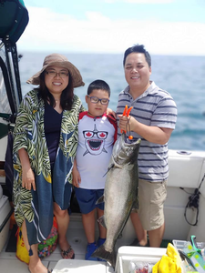 3 people fishing in ON, Canada