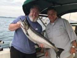 An image of two people fishing in Oakville