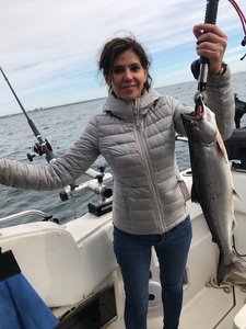 A single person fishing in the water at Oakville