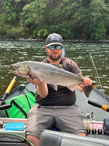 Angler with rainbow trout in Oregon