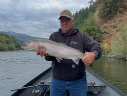 Angler fishing for a rainbow trout in OR
