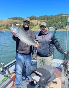 Angler with a stunning rainbow trout fish caught in Grants Pass