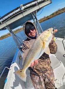 A lone angler fishing in Texas City