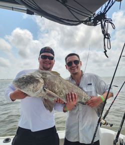 Two people fishing in TX