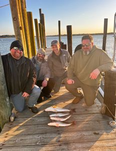Four anglers enjoying a fishing trip in VA
