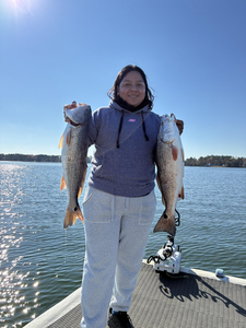Double redfish using jigging and trolling techniques in partly cloudy conditions!
