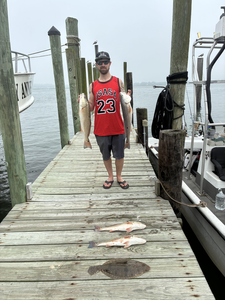 Flounder and Redfish bonanza on a partly cloudy day!