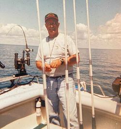 Person fishing in Mackinaw City