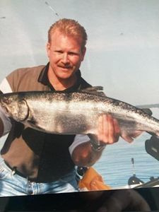 Angler with a 20-inch fish in Mackinaw City