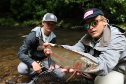 Anglers fishing in Georgia with a big 23-inch fish