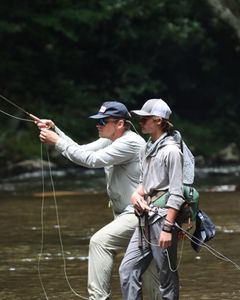 Two people fishing in Cornelia