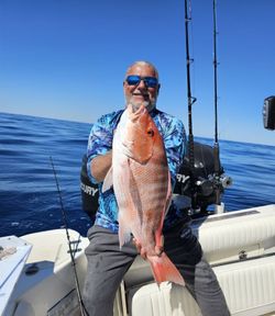 Skilled angler enjoying a day of fishing in North Carolina
