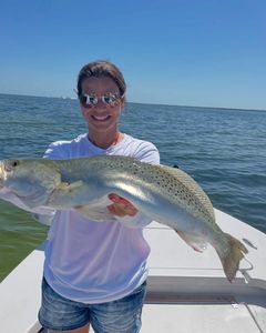 Angler with a big fish in Ruskin
