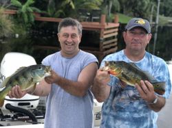 Two people fishing in Delray Beach
