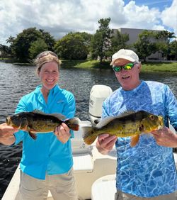 3 people fishing with nets in Delray Beach