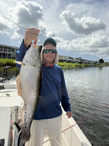 Nice catch using light tackle trolling! Partly cloudy conditions made for a great day on the water.