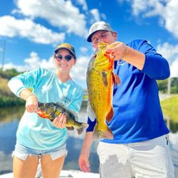 2 fishermen reeling in large catch in FL