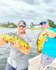 Two fishermen catching fish in Florida