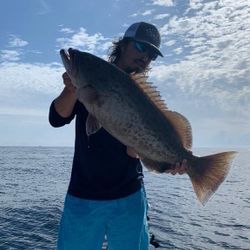 Captain Clay with a solid Gag grouper 

