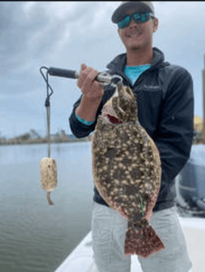 Photograph of a 21-inch summer flounder caught in Pensacola