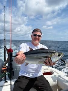 Fishing charter catch display with fish on boat deck in Morehead City NC