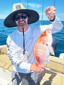 Angler with a fish in Niceville