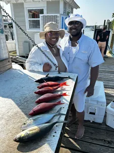3 fishing rods with line in water near Niceville