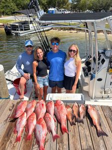 Four people fishing at Orange Beach