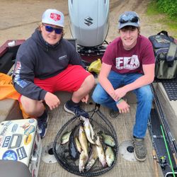 Two people fishing in WI