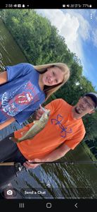 Two people fishing in Mosinee