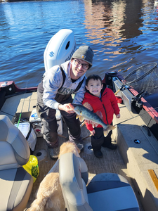Two people fishing in WI