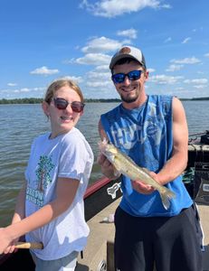 Two people fishing in Mosinee