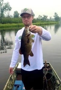 Fisherman catching a fish in Mosinee