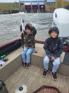 Three people fishing in Mosinee