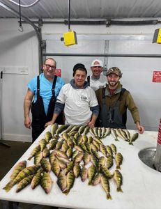3 fishermen enjoying a successful fishing trip in Mosinee
