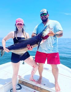 Two people enjoying a great fishing trip in Gulf Shores