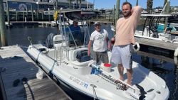Three people fishing at North Myrtle Beach