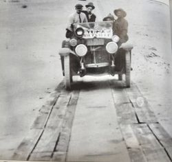 Vintage automobile on wooden planks in Yuma AZ during historical tour