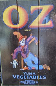 Vintage OZ brand vegetable crate label featuring scarecrow character from Yuma Arizona