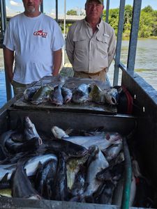 Two people fishing in TX