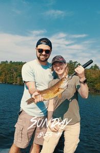 Two people enjoying a fishing adventure in Orland