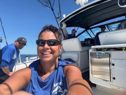 Four people gathered for a fishing outing at 990 Point Breeze Road