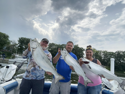Three anglers with a catch of 3 big fish at 990 Point Breeze Road