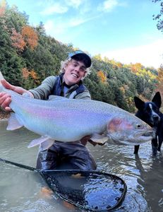 Photograph of a large rainbow trout caught in Angola during a fishing trip.