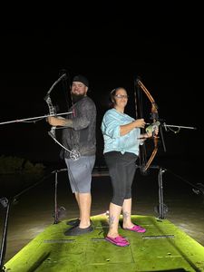 Two people fishing in FL