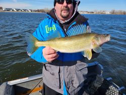 A fisherman reeling in a 19-inch catch in Wisconsin Rapids