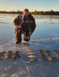 Angler with fishing gear near WI location