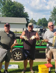 Five fishing rods with nice catch on a sunny day in Wisconsin Rapids
